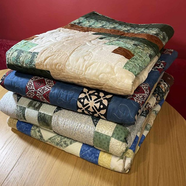 Quilt Collection Stack of folded quilt blankets