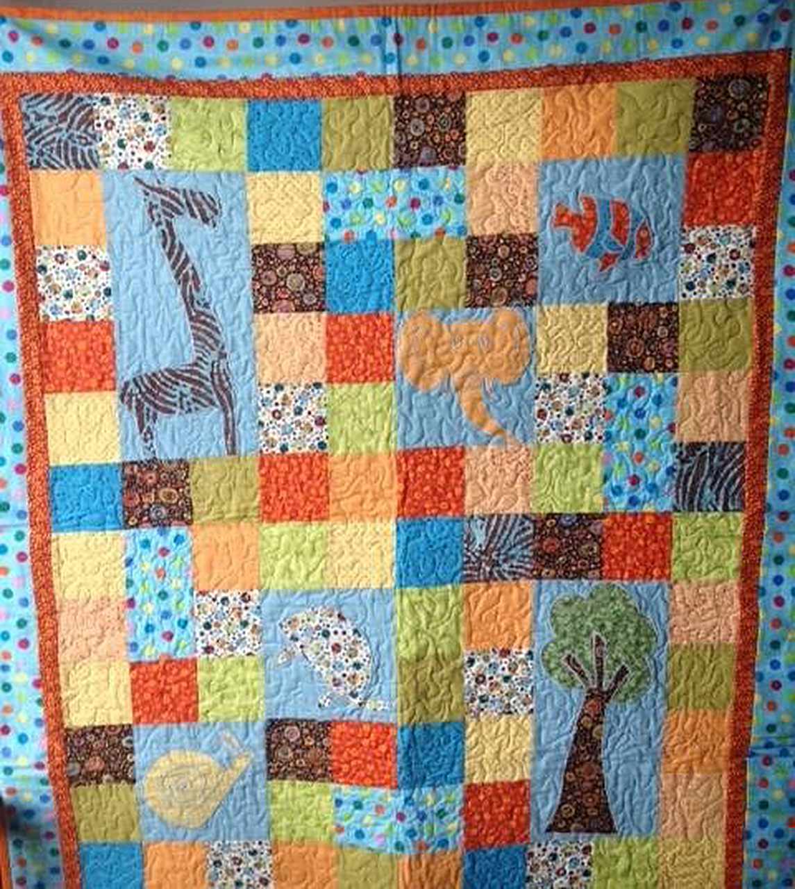 Block Quilt with applique designs Block Quilt